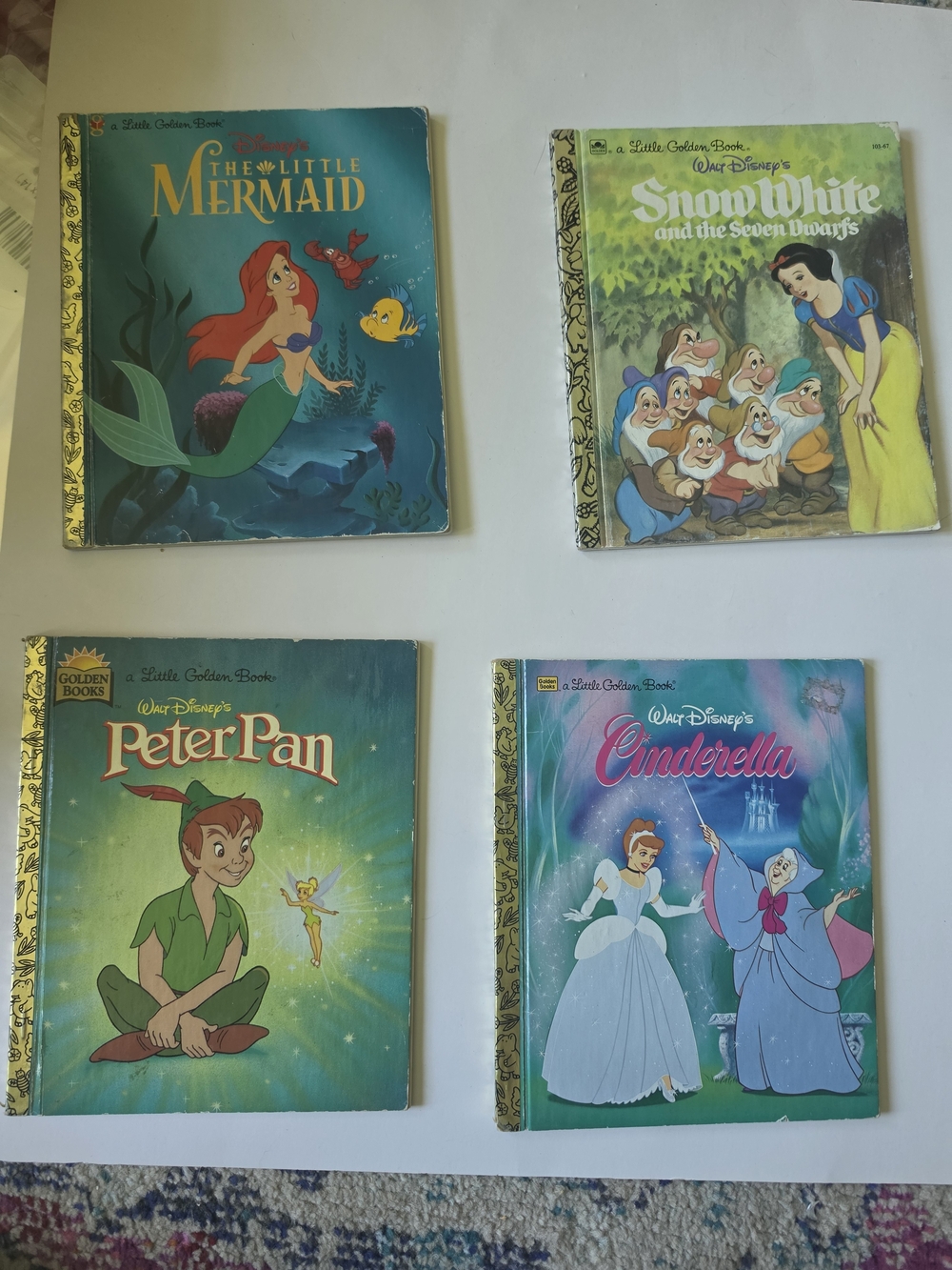 four vintage Little Golden Books featuring classic Disney stories.